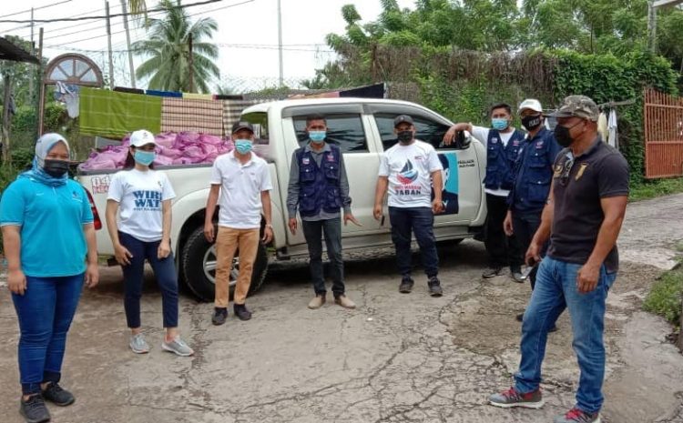  Mengagihkan bakul bantuan makanan bersasar